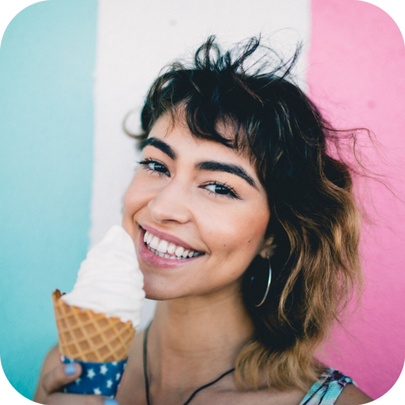 Happy girl with white ice cream